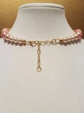 Pink and gold bead statement necklace with rhinestones and crystals