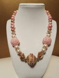 Pink and gold bead statement necklace with rhinestones and crystals