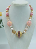 Pink and gold bead statement necklace with rhinestones and crystals