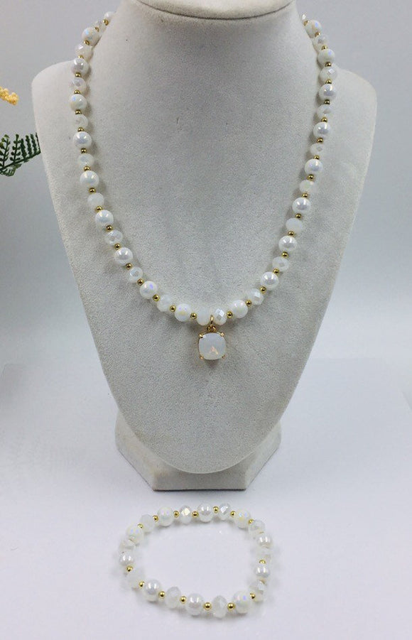 White and gold glass beaded necklace with matching bracelet set.