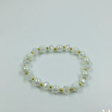 White and gold glass beaded necklace with matching bracelet set.