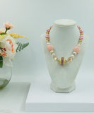 Pink and gold bead statement necklace with rhinestones and crystals
