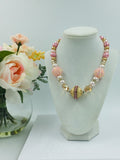 Pink and gold bead statement necklace with rhinestones and crystals