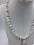 White and gold glass beaded necklace with matching bracelet set.