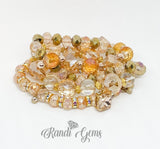 Clear Amber, Pink and Gold Tone 4 piece Bracelet Set w/ Charm