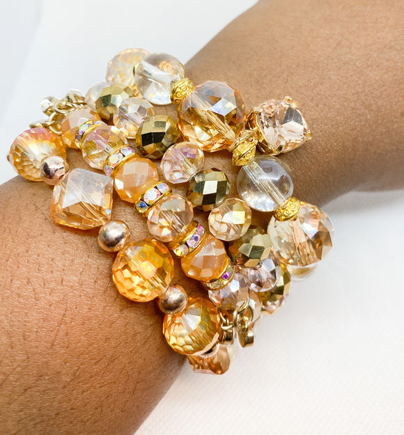 Clear Amber, Pink and Gold Tone 4 piece Bracelet Set w/ Charm